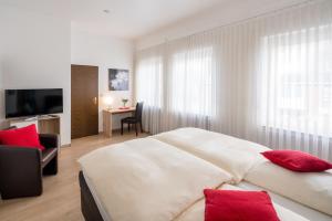 Voodi või voodid majutusasutuse Hotel Kemper toas