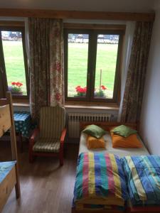 Posteľ alebo postele v izbe v ubytovaní Villa jumper widok na całe Tatry łazienka nie jest w pokoju i jest wspólna z innymi ludźmi