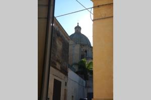 a view of a building from a window of a building at GRAZIOSO MONOLOCALE NEL CUORE DEL CENTRO STORICO in Francavilla Fontana