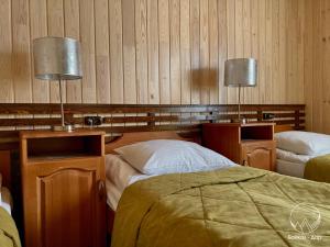 Llit o llits en una habitació de Baykal-Dar