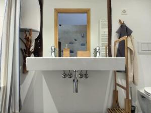 Ванна кімната в Guesthouse "Castello del Nucleo"