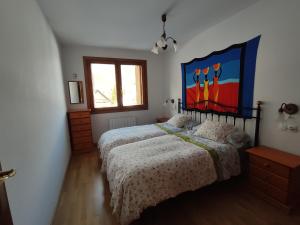 Postel nebo postele na pokoji v ubytování Apartamento conques Linsoles / Benasque