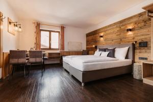 Postel nebo postele na pokoji v ubytování Alte Schmiede - das kleine Hotel