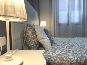 Postel nebo postele na pokoji v ubytování Apartamento Civitas
