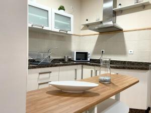 Kuchyň nebo kuchyňský kout v ubytování Apartamento Civitas
