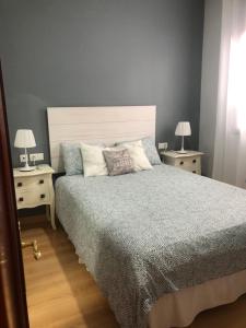 Postel nebo postele na pokoji v ubytování Apartamento Civitas