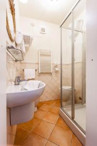 Kylpyhuone majoituspaikassa Residence Isola Verde Cisanello