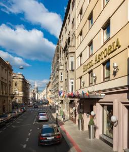 a city street filled with cars and pedestrians at Best Western Premier Hotel Astoria in Zagreb