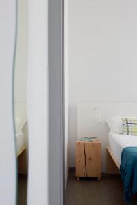 Postel nebo postele na pokoji v ubytování Hotel Madison