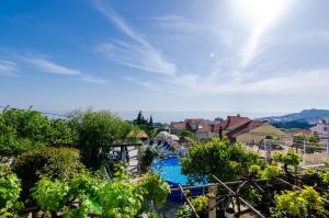 a view of a resort with a swimming pool at Apartments Nicol in Dubrovnik