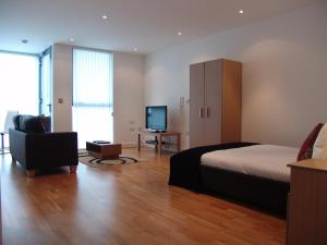 TV a/nebo společenská místnost v ubytování Quay Apartments