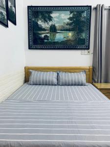 Postel nebo postele na pokoji v ubytování Friendly House Homestay