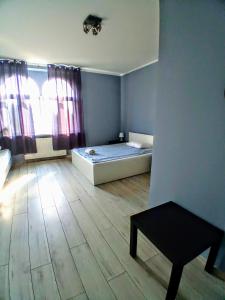 Postel nebo postele na pokoji v ubytování Central Sopot