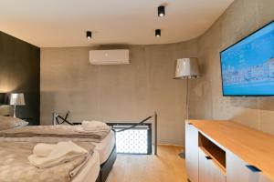 Posteľ alebo postele v izbe v ubytovaní The Place Apartments Split
