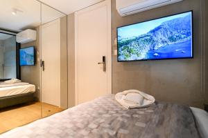 Posteľ alebo postele v izbe v ubytovaní The Place Apartments Split
