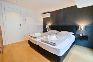 Posteľ alebo postele v izbe v ubytovaní The Place Apartments Split