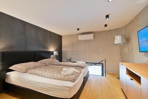 Posteľ alebo postele v izbe v ubytovaní The Place Apartments Split
