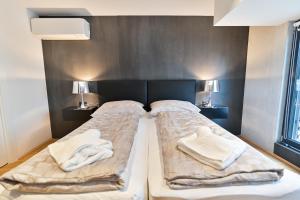 Posteľ alebo postele v izbe v ubytovaní The Place Apartments Split