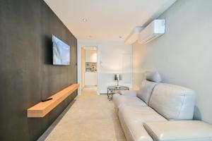 Televízia a/alebo spoločenská miestnosť v ubytovaní The Place Apartments Split