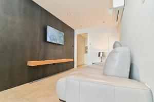 Televízia a/alebo spoločenská miestnosť v ubytovaní The Place Apartments Split