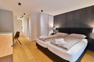 Posteľ alebo postele v izbe v ubytovaní The Place Apartments Split