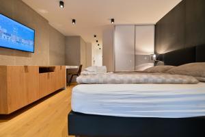 Posteľ alebo postele v izbe v ubytovaní The Place Apartments Split