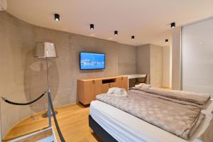 Posteľ alebo postele v izbe v ubytovaní The Place Apartments Split