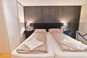Posteľ alebo postele v izbe v ubytovaní The Place Apartments Split