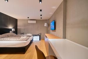 Posteľ alebo postele v izbe v ubytovaní The Place Apartments Split