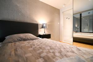 Posteľ alebo postele v izbe v ubytovaní The Place Apartments Split