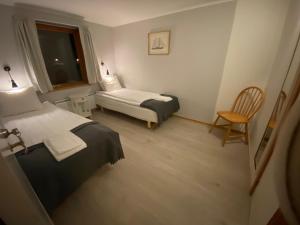 Rúm í herbergi á Alvaret Hotel & Hostel