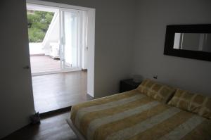 Posteľ alebo postele v izbe v ubytovaní Encantador apartamento en S'Agaró-Platja de Aro