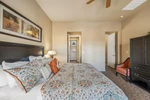 a bedroom with a large bed and a dresser at C48 Lux Villa Near Clubhouse With Mtn Views Condo in La Quinta
