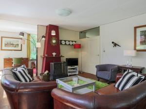 A seating area at Beautiful Holiday Home with Garden in Huijbergen