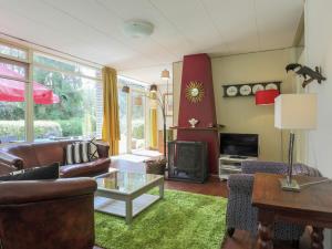 A seating area at Beautiful Holiday Home with Garden in Huijbergen