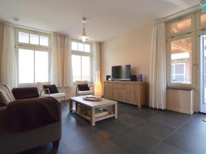 Istumisnurk majutusasutuses Luxury apartment in Posterholt with a terrace