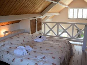 Postel nebo postele na pokoji v ubytování Noordwijk Beachside Escape