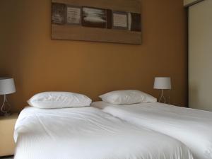 Ένα ή περισσότερα κρεβάτια σε δωμάτιο στο Chic Home with Sauna +32 φωτογραφίες