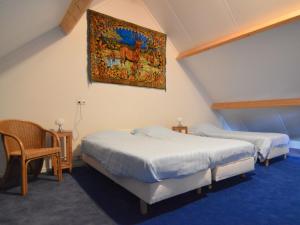 Katil atau katil-katil dalam bilik di Peaceful Holiday Home in Geesteren with Roofed Terrace