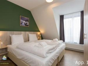Postel nebo postele na pokoji v ubytování Alluring Apartment close to centre & sea