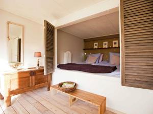 Tempat tidur dalam kamar di Cozy Holiday Home in Bergen with Private Terrace