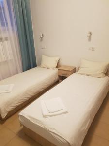 Postel nebo postele na pokoji v ubytování Hostel Mleczna - Metro Zacisze
