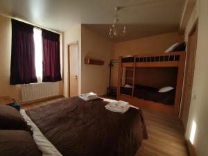 Letto o letti in una camera di Hotel Horizon Kazbegi