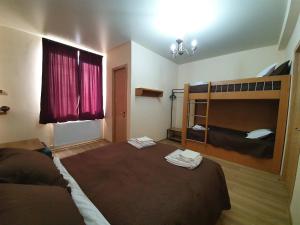 Letto o letti in una camera di Hotel Horizon Kazbegi
