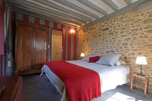 Un pat sau paturi într-o cameră la Le Verger (Le Plessis)