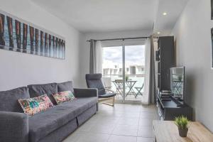 A seating area at 4Greta Corralejo Apartment