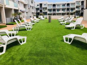 A garden outside 4Greta Corralejo Apartment