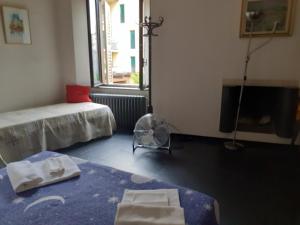 Posteľ alebo postele v izbe v ubytovaní Romeo and Juliet Apartaments
