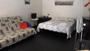 Posteľ alebo postele v izbe v ubytovaní Romeo and Juliet Apartaments