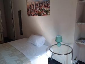 Posteľ alebo postele v izbe v ubytovaní Romeo and Juliet Apartaments